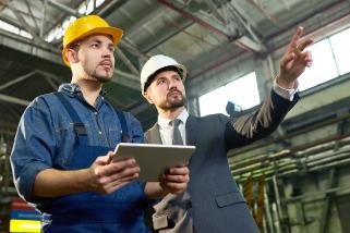 Workers discussing plans